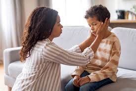 A caring adult supporting a child