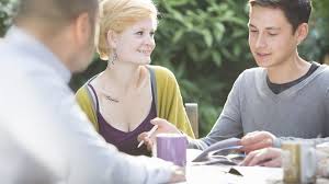 People talking around a table